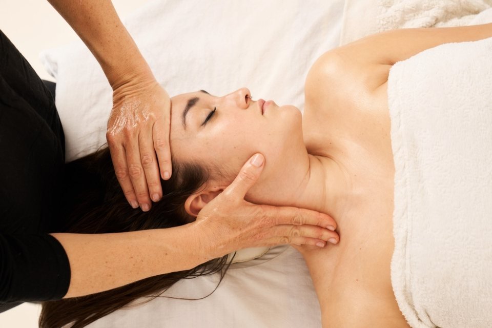 Registered massage therapy to the head and neck